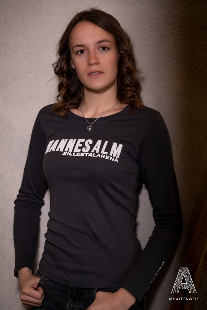 Dark gray long-sleeved shirt with “Hannes Alm & Zillertal Arena” and “partyarena.at” printed on the front and left sleeve.