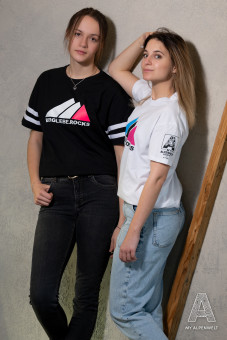 Two women wearing “Bergliebe.Rocks” T-shirts