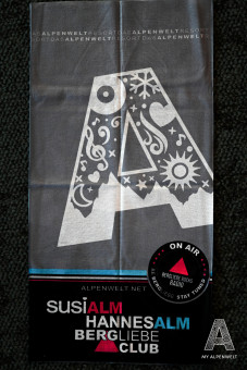 grey tube scarf with logos